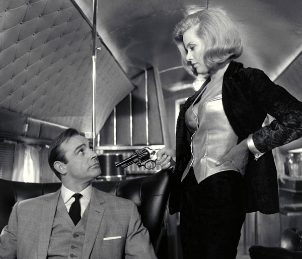 Goldfinger’s Pilot Pussy Galore (Honor Blackman) & Bond (Sean Connery) © 1964 Danjaq, LLC & United Artists Corporation. All rights reserved